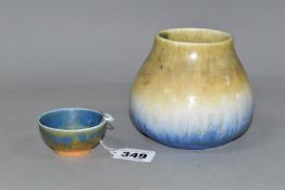 TWO PIECES OF RUSKIN POTTERY, comprising a squat baluster crystalline glazed vase, in buff, white