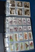 CIGARETTE CARDS, Three Albums comprising nineteen complete sets of cards and one incomplete set (