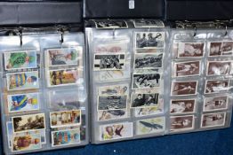 CIGARETTE CARDS, three albums containing over 800 Cigarette Cards, in part sets and high value '
