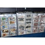 CIGARETTE CARDS, three albums containing over 800 Cigarette Cards, in part sets and high value '