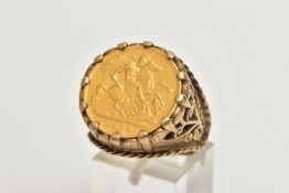 A HALF SOVEREIGN RING, half sovereign dated 1898, claw set in a yellow gold mount, openwork