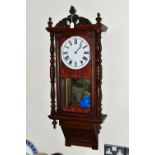 A WALL CLOCK AND A BAROMETER, comprising a large wooden cased wall clock, back bears partial
