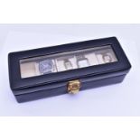 A WATCH DISPLAY BOX WITH FOUR WRISTWATCHES, to include a gents 'Citizen Eco-drive W100', watch,