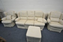 A FLORAL AND GOLD UPHOLSTERED FOUR PIECE LOUNGE SUITE, comprising a three seater sofa, length 206cm,