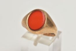 A 9CT GOLD SIGNET RING, an oval cut carnelian set within a yellow gold mount, hallmarked 9ct