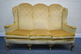 A GEORGIAN STYLE HIGH WING BACK SOFA, gold fabric, flat outswept arms, on four cabriole legs, length