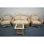 A WICKER THREE PIECE CONSERVATORY SUITE, with loose cushions, comprising a two seater settee, and
