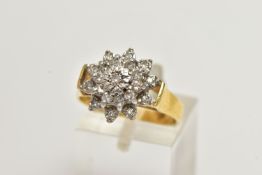 AN 18CT GOLD DIAMOND CLUSTER RING, of a tiered flower design set with single cut and round brilliant