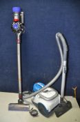 A DYSON SV10 ANIMAL CORDLESS VACUUM with charger along with a Hoover TSP2006 vacuum cleaner (both