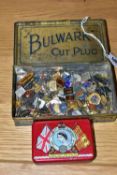 A COLLECTION OF PIN BADGES AND TWO VINTAGE TINS, to include a quantity of metal pin badges, many