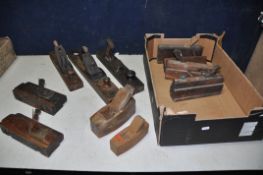 A COLLECTION OF VINTAGE WOODEN PLANES comprising two coffin planes, three jointer planes and six