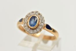 A 14CT GOLD, SAPPHIRE AND DIAMOND CLUSTER RING, of an oval form, centrally set with an oval cut