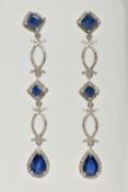 A PAIR OF DIAMOND AND SAPPHIRE DROP EARRINGS, long drops set with two square cut mid blue