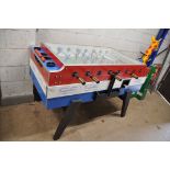 AN ESD COMPITION TABLE FOOTBALL GAME coin operated, width 153cm x total depth with handles 104cm x