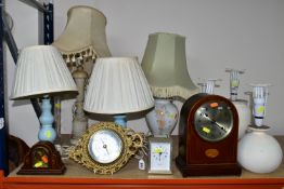 GROUP OF TABLE LAMPS AND MANTEL CLOCKS, comprising three repainted cream table lamps, a mahogany