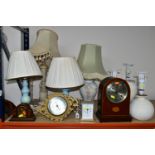 GROUP OF TABLE LAMPS AND MANTEL CLOCKS, comprising three repainted cream table lamps, a mahogany