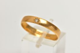 A DIAMOND SET, 22CT GOLD BAND RING, designed with a star set single cut diamond, to a polished band,