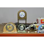 A COLLECTION OF MID - CENTURY CLOCKS, comprising an Art Deco style arched mirrored electric clock