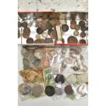 A TIN OF COINS AND BANKNOTES, to include silver content coins such as half crowns, crowns, three