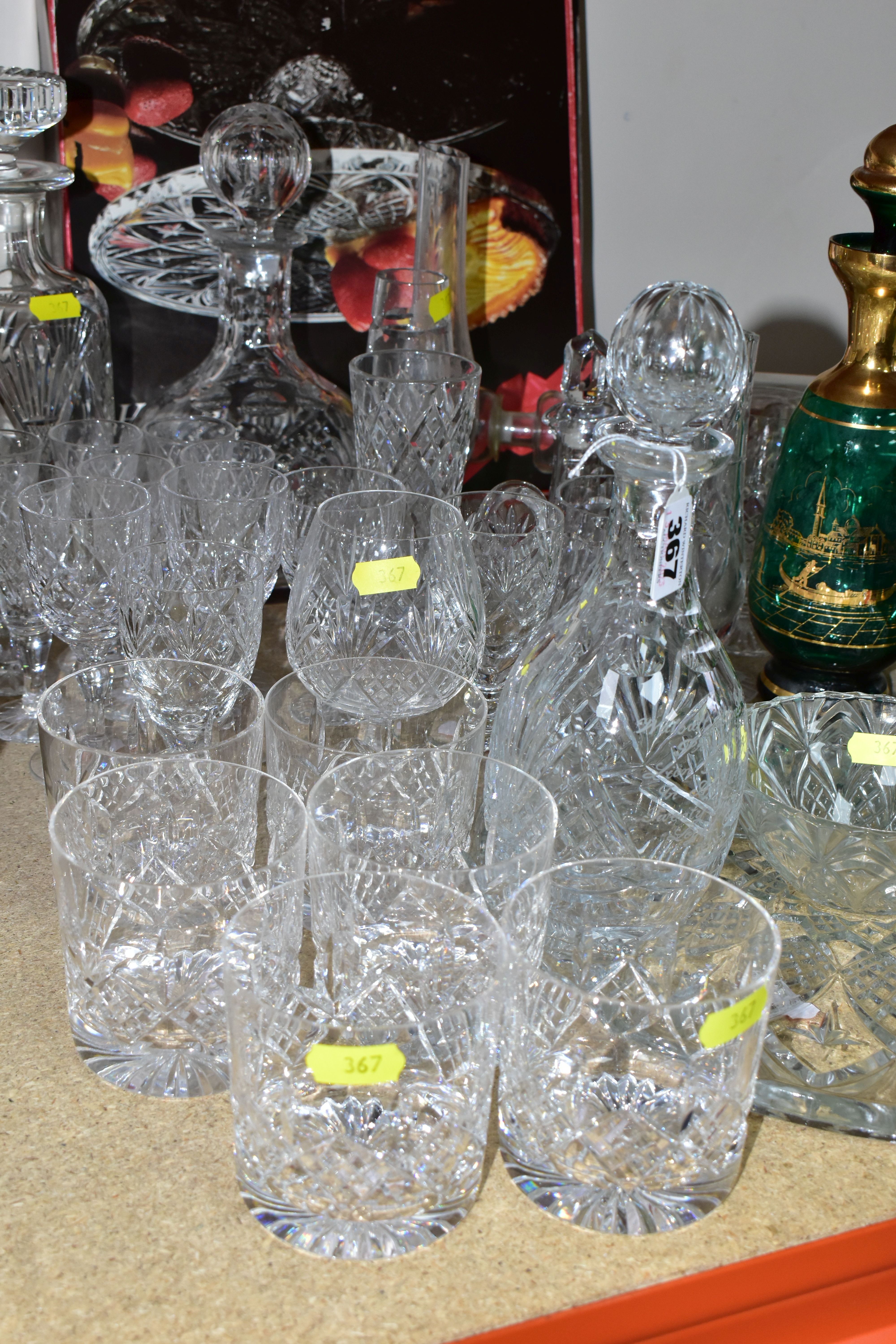 A GROUP OF CUT CRYSTAL AND COLOURED GLASS, comprising three cut crystal decanters, oil decanter, six - Image 2 of 3