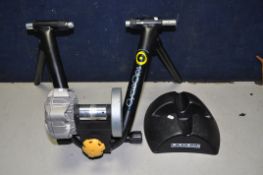 A CYCLE OPS INDOOR TURBO TRAINER