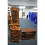 FOUR YEWWOOD FURNITURE PIECES, to include a small chest of four drawers, corner cupboard, tv stand