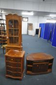 FOUR YEWWOOD FURNITURE PIECES, to include a small chest of four drawers, corner cupboard, tv stand