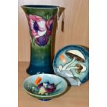 THREE PIECES OF MOORCROFT POTTERY, comprising an Anemones pattern vase of flared form, tubelined