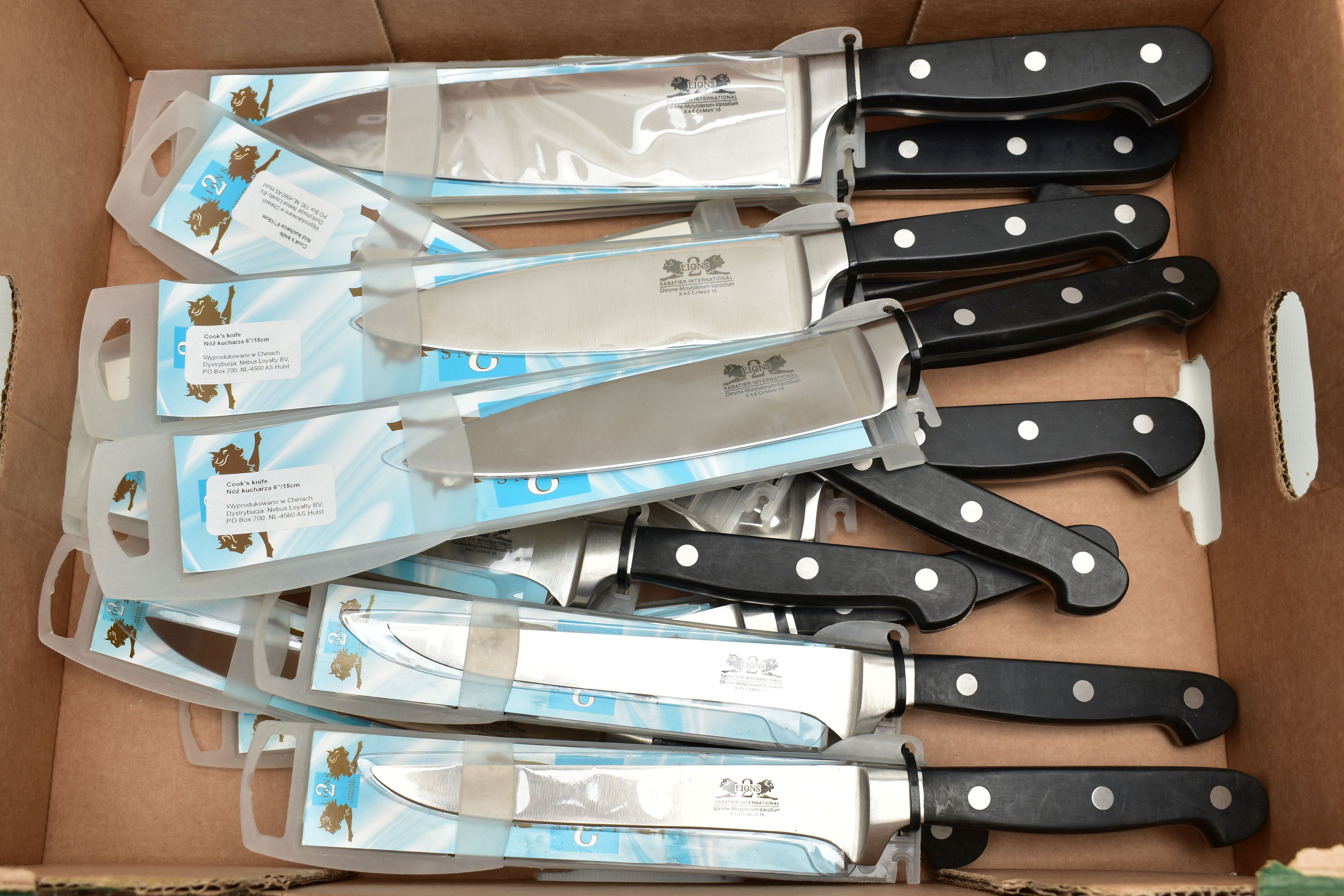 A BOX OF NEW AND UNOPENED KITCHEN KNIVES, twelve in total to include four 8 chefs knives, three 6