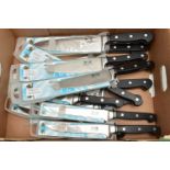 A BOX OF NEW AND UNOPENED KITCHEN KNIVES, twelve in total to include four 8 chefs knives, three 6