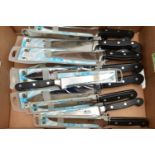 A BOX OF NEW AND UNOPENED KITCHEN KNIVES, twelve in total to include four 8 chefs knives, two 6
