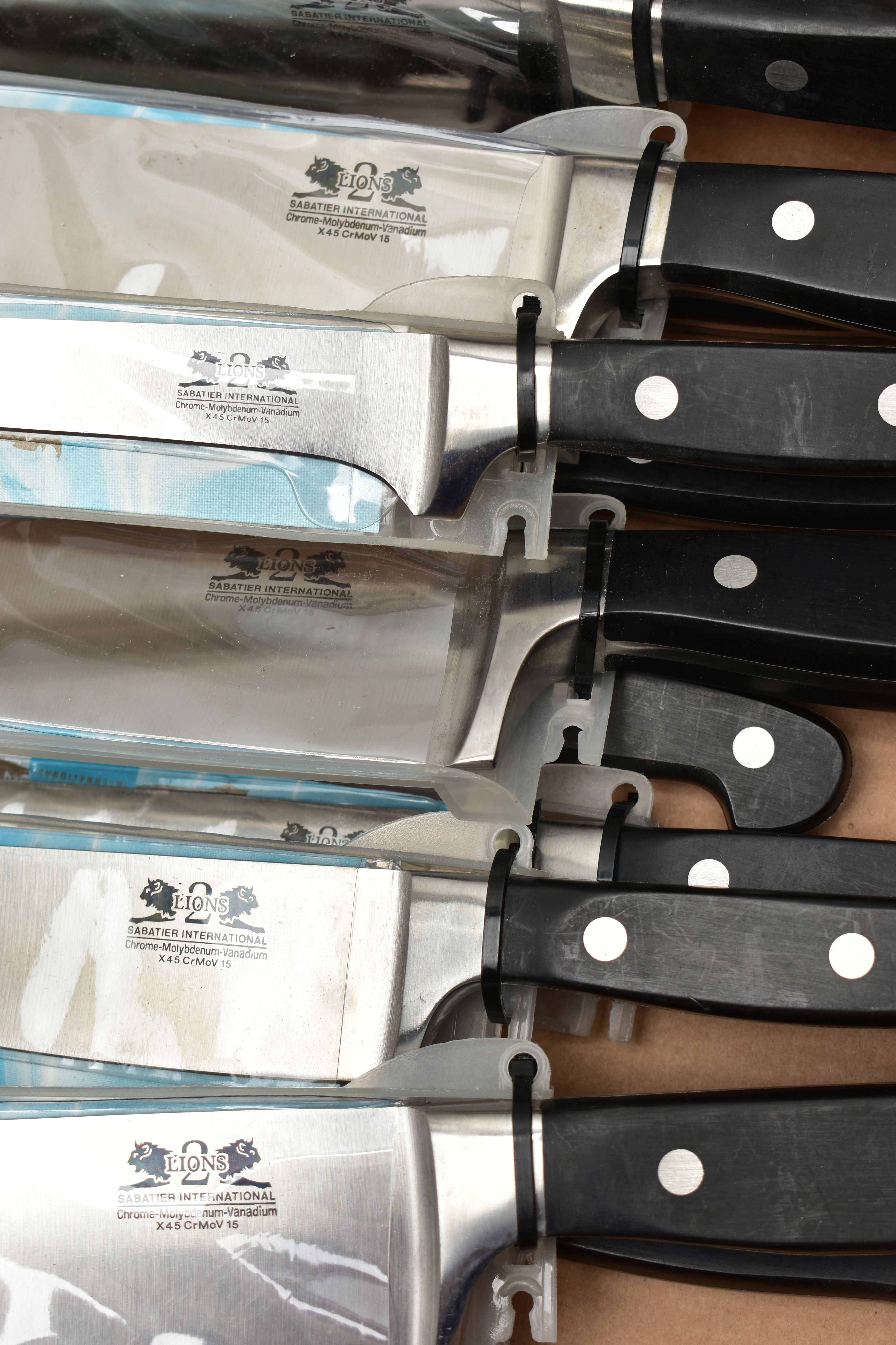 A BOX OF NEW AND UNOPENED KITCHEN KNIVES, twelve in total to include four 8 chefs knives, two 6 - Image 2 of 2