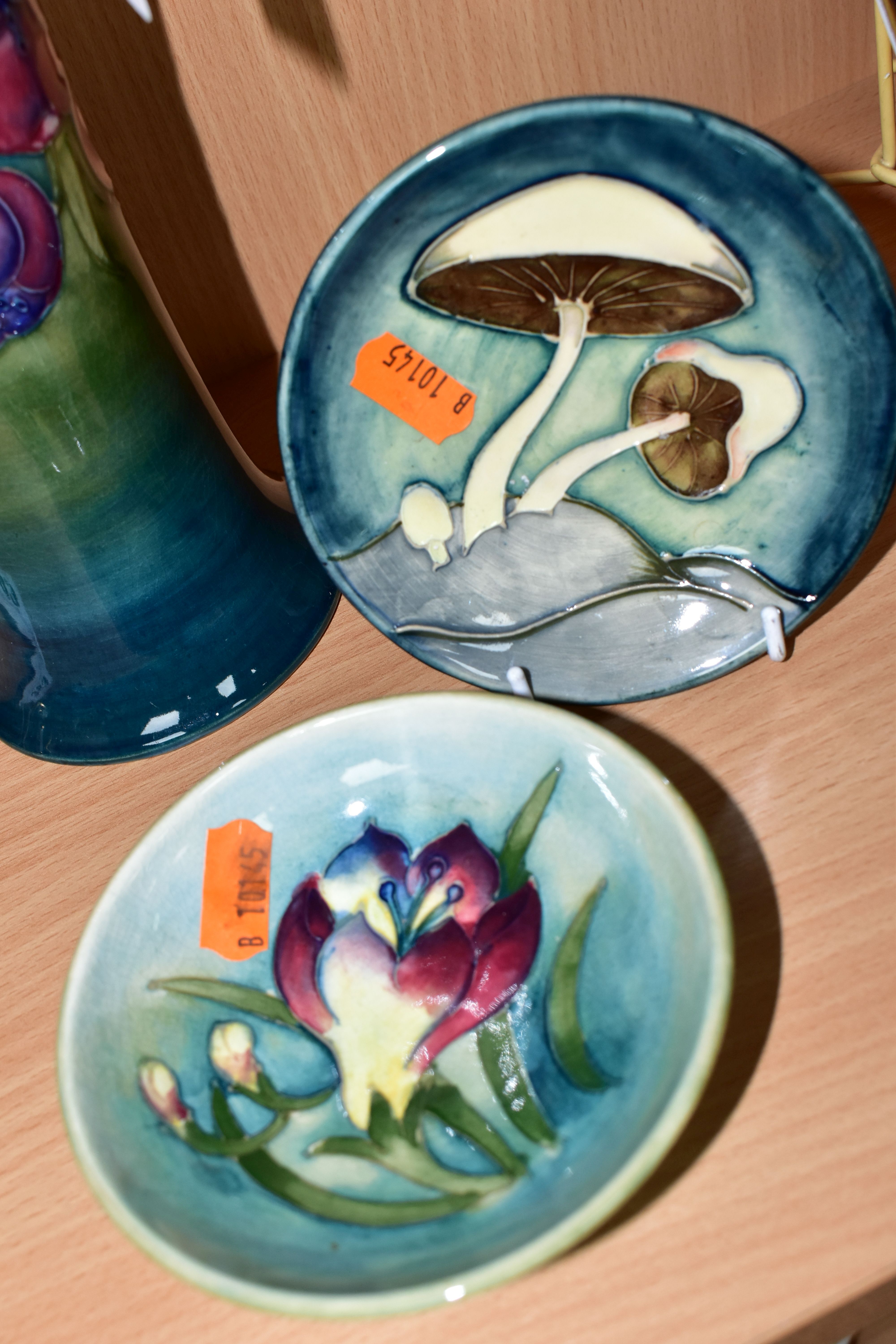 THREE PIECES OF MOORCROFT POTTERY, comprising an Anemones pattern vase of flared form, tubelined - Image 2 of 4