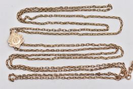 A YELLOW METAL DOUBLE LONGUARD CHAIN, double belcher link chains with a floral detailed sliding