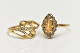TWO RINGS, the first a 9ct gold cluster ring set with a marquise cut citrine in a surround of