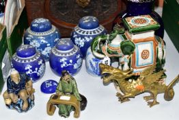 A GROUP OF ORIENTAL ITEMS, comprising four Prunus blossom decorated covered ginger jars, tallest
