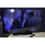 A SAMSUNG UE50H5500AK 50in TV with remote (PAT pass and working) (screen looks to have light spot