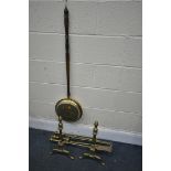 A PAIR OF BRASS ANDIRONS, with three fire irons, and a brass warming pan (6)