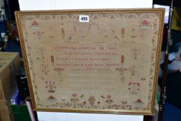 AN EARLY VICTORIAN NEEDLEWORK SAMPLER, the stained linen ground embroidered in coloured silks with a