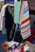 THREE BOXES OF LADIES VINTAGE CLOTHING AND ACCESSORIES, to include a large red Trippa suitcase, a