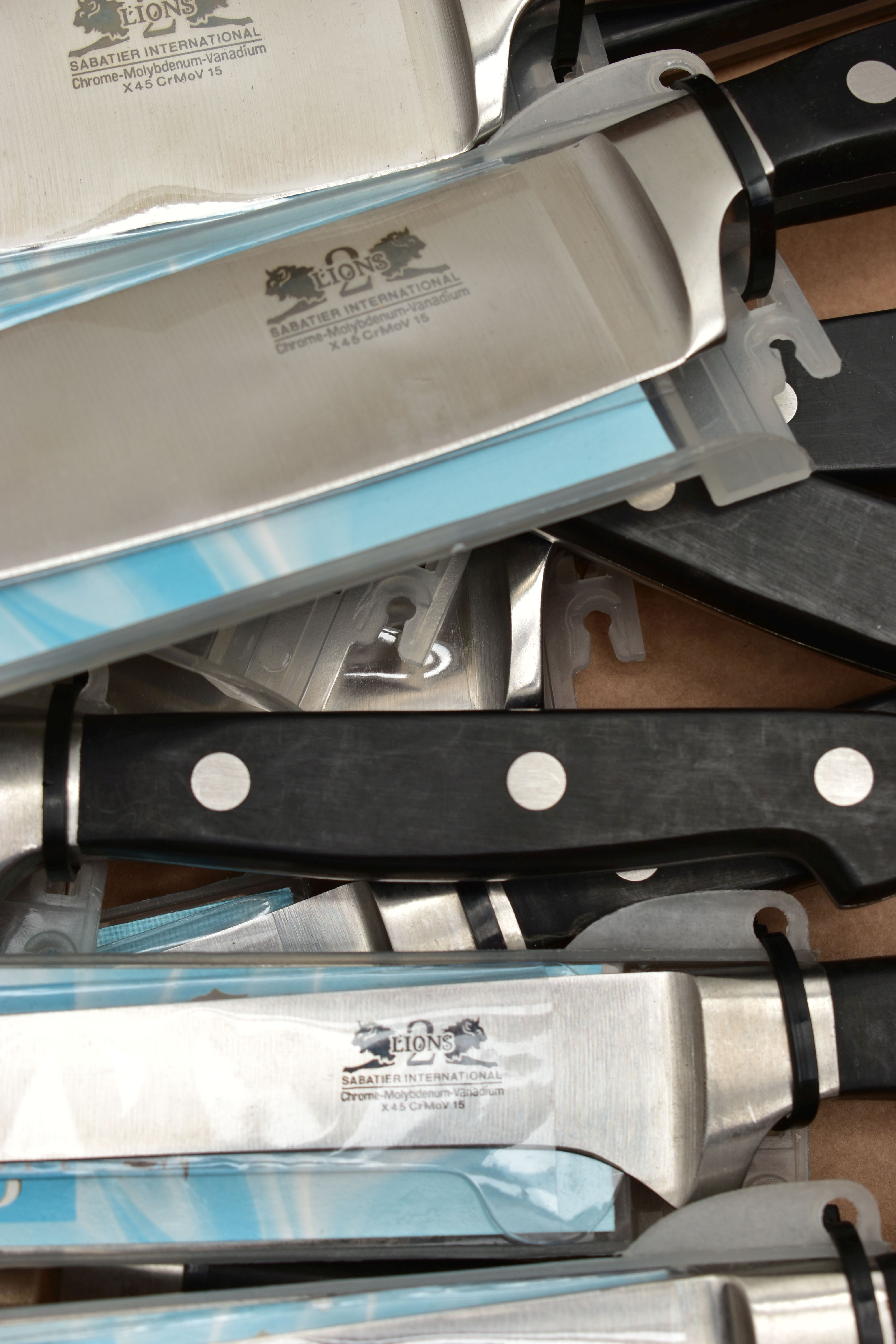 A BOX OF NEW AND UNOPENED KITCHEN KNIVES, twelve in total to include four 8 chefs knives, three 6 - Image 2 of 2