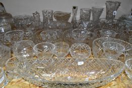 A COLLECTION OF CUT CRYSTAL AND OTHER GLASS WARES, over forty pieces, to include four vases
