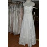 TWELVE WEDDING DRESSES, retail stock clearance (some may have marks or very light damage) varying in
