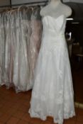 TWELVE WEDDING DRESSES, retail stock clearance (some may have marks or very light damage) varying in