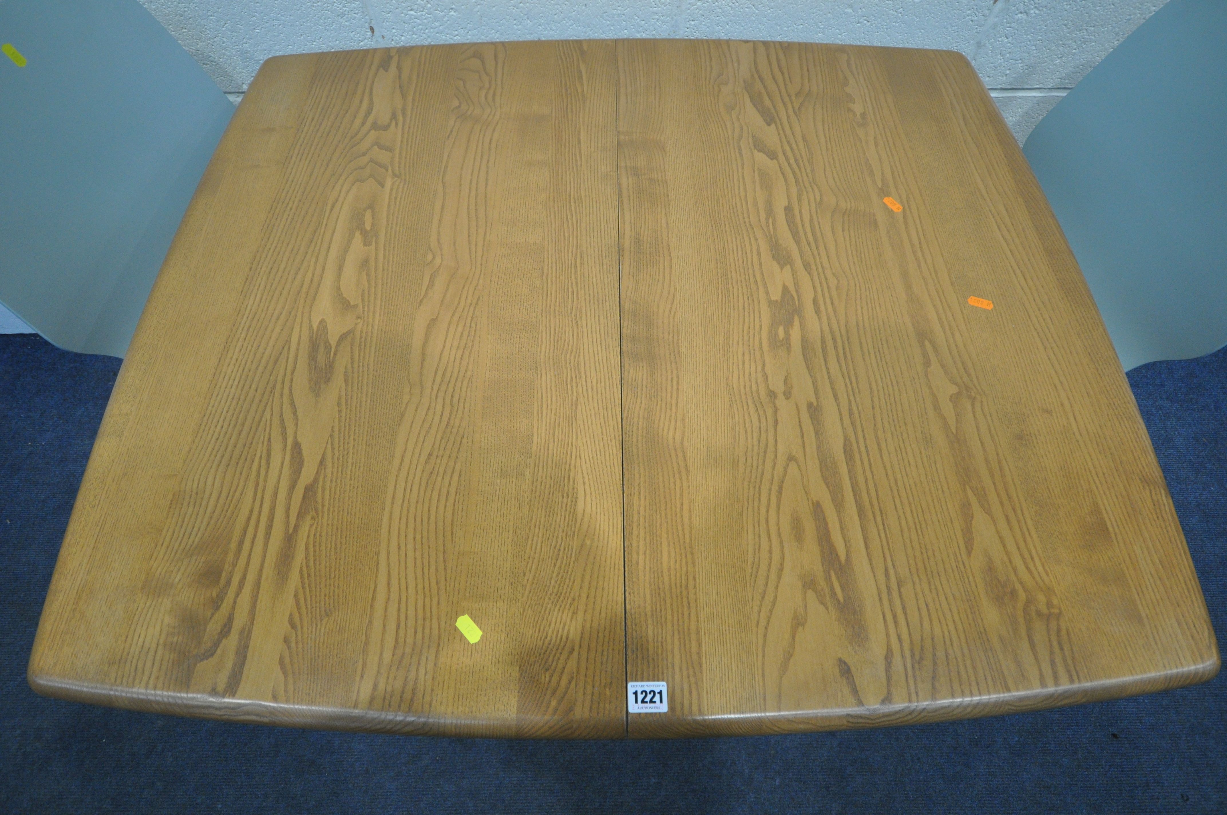 AN ERCOL BLONDE ELM WINDOR EXTENDING DINING TABLE, with a single fold out leaf, on a single pedestal - Image 3 of 4