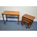 A MID CENTURY TEAK NEST OF TABLES LARGEST TABLE, with a swivel fold over top, open width 82cm x