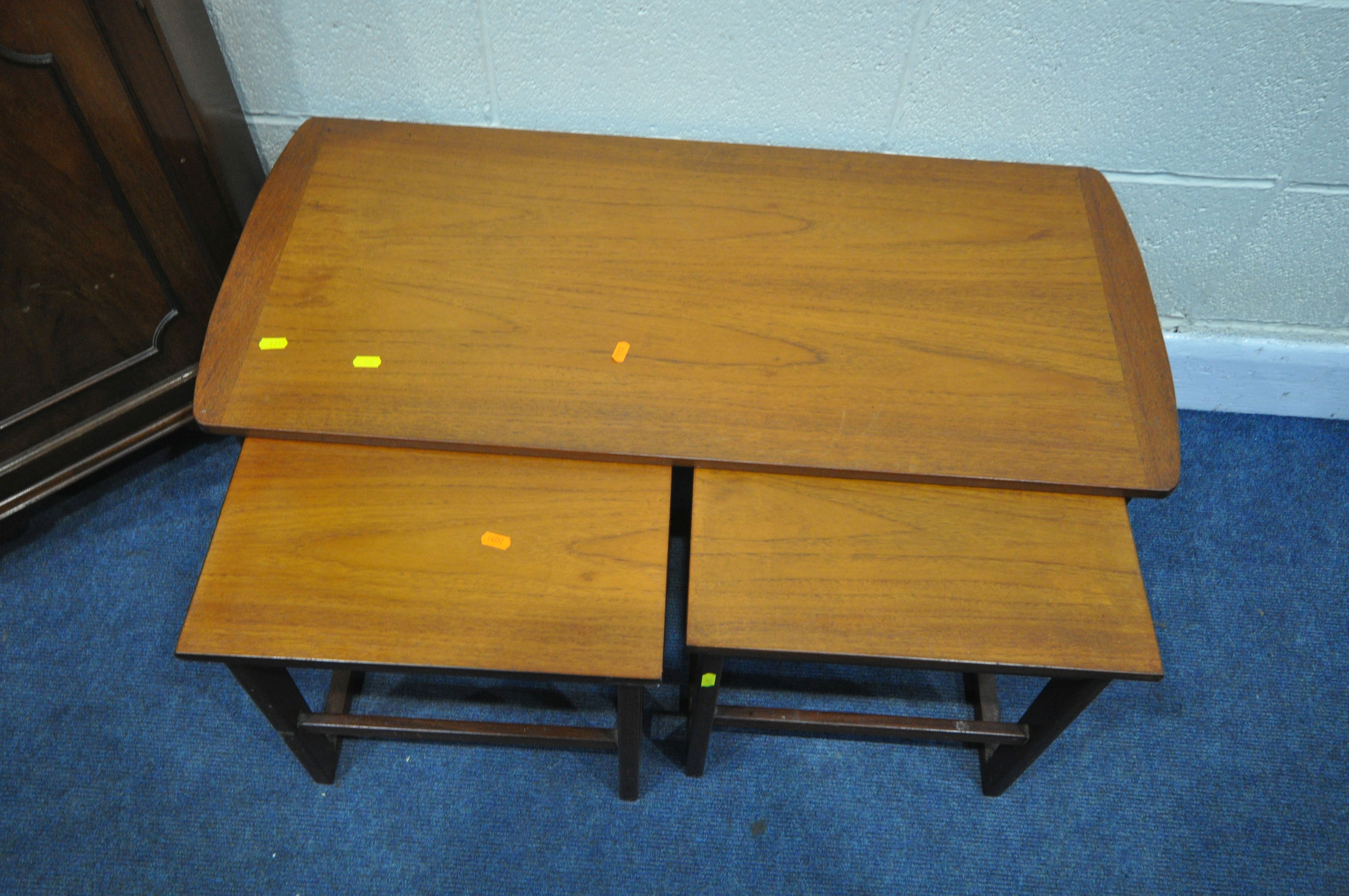 A MID CENTURY TEAK NEST OF THREE TABLES, largest length 94cm x depth 34cm x height 41cm, and a - Image 3 of 3