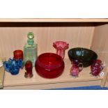 NINE PIECES OF VICTORIAN AND LATER COLOURED GLASSWARE, including two cranberry jugs, a ruby bowl,