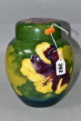 A LARGE MOORCROFT POTTERY 'HIBISCUS' GINGER JAR AND COVER, tube lined with pink, purple and yellow
