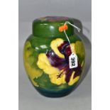 A LARGE MOORCROFT POTTERY 'HIBISCUS' GINGER JAR AND COVER, tube lined with pink, purple and yellow